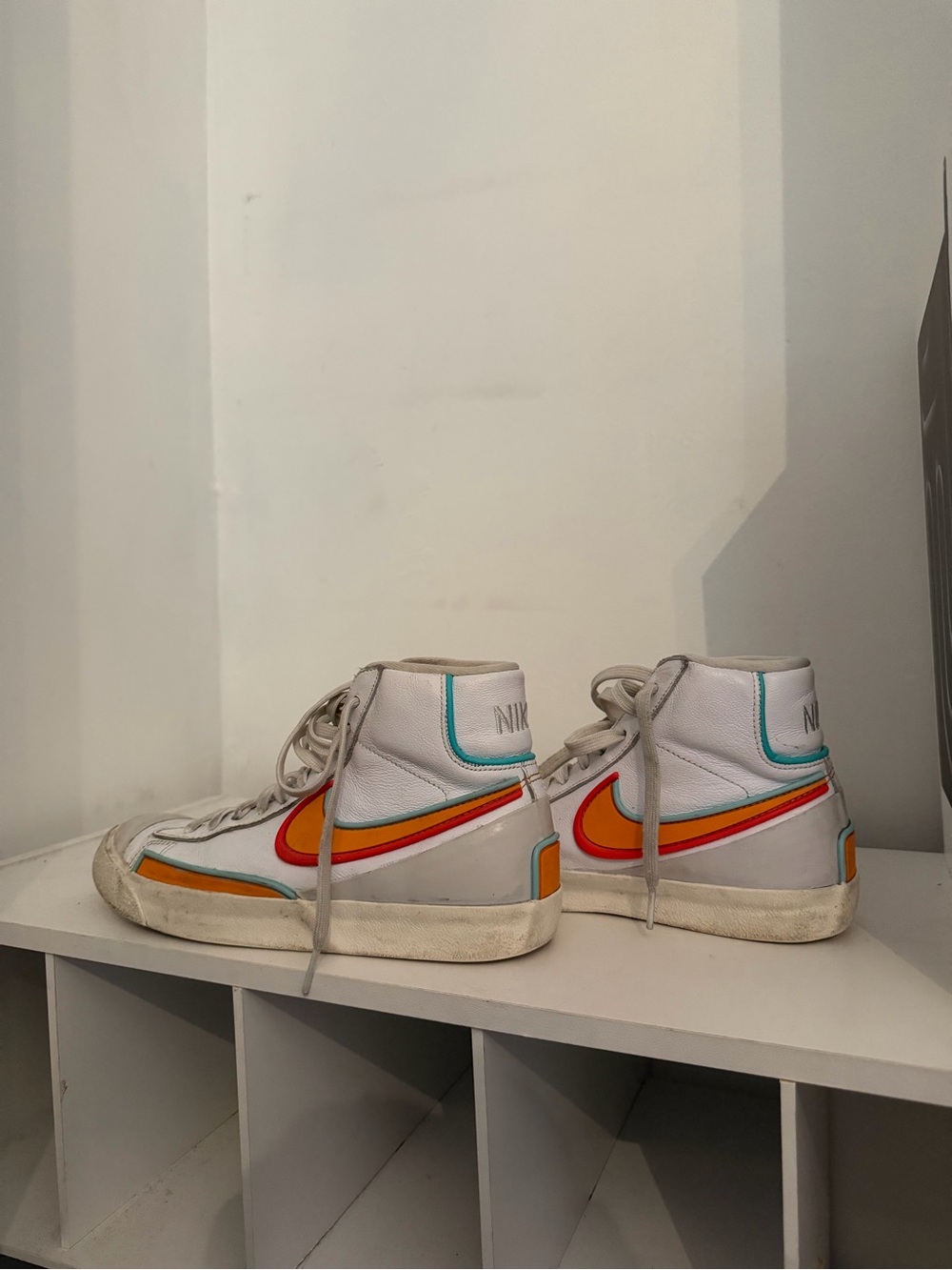 Nike White High-Top Sneakers with Orange & Teal Accents